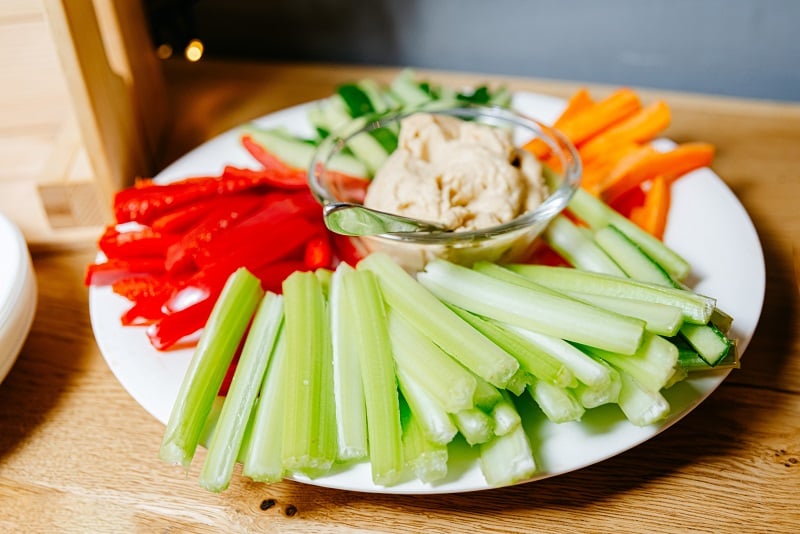 A plate of veggies and hummus