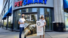 World Animal Protection staff in front of PetSmart with a petition