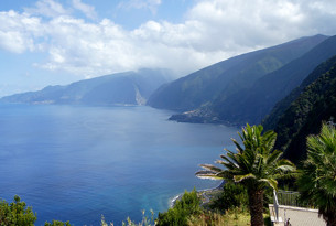 A landscape photo of the tall mountains and seas of the Madeira Whale Heritage Area situated in Madeira Island, Portugal.