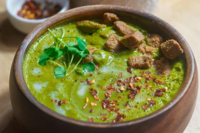A bowl of green vegan soup